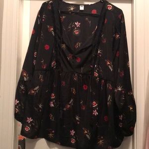 Peplum top with floral details